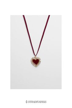 Cord choker necklace with heart Choker Outfit Aesthetic, Party Choker With Heart Pendant, Trendy Party Choker With Heart Pendant, Trendy Heart Charm Choker For Party, Trendy Party Choker With Heart Charm, Trendy Party Heart Choker Necklace, Trendy Heart Pendant Choker For Valentine's Day, Trendy Heart Pendant Choker As Gift, Trendy Heart Pendant Choker For Gift