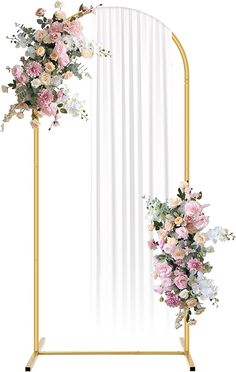 an arch with flowers on it and a curtain behind it in front of a white background