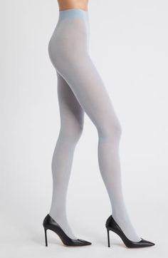 Like a second skin, these sheer tights envelop your legs in a fine layer of color. 65% modal, 22% polyamide, 8% cashmere, 5% elastane Hand wash, dry flat Made in Italy Elegant Fitted Hosiery With Soft Touch, Elegant Fitted Soft Touch Hosiery, Solid Color Tight Legwear With Soft Touch, Fitted Soft Solid Bottoms, Fitted Soft Solid Color Bottoms, Soft Fitted Solid Color Bottoms, Elegant Solid Color Elastane Tights, Solid Color Soft Fitted Bottoms, Elegant Micro-elastic Elastane Hosiery