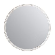 a round mirror on a white background with no image to describe, it's not clear