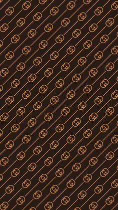 an orange and black background with circles