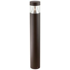 a brown cylinder with a light on top