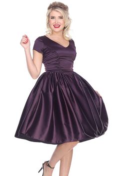 "Samples were made prior to 2016, ready to wear, made in USA,.   Evening Dress for Cocktails Mid Century style Color:  Dark Eggplant Purple Material:  Satin Size:  6 ~ Small Measures Bust 16\" fitting 32\" to 37\" and Waist 13\" fitting 25\"-27\" Very elegant color, perfect for holidays, Cocktails, Date Dinner or any reason to dress up,. Lots of gathers in the skirt, very heavy, short sleeves,   Retail price $150  Sale price Samples are final sales." Retro A-line Skirt For Party, Fitted Full Skirt Mini Dress For Party, Fitted A-line Satin Skirt, Fitted V-neck Dress With Pleated Skirt, Fitted Flared Skirt Cocktail Dress, Knee-length Party Skirt With Pleated Waist, Fitted Cocktail Dress With Flared Skirt, Purple Satin Party Skirt, Purple Satin Skirt For Party