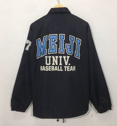 "ITEM DETAILS: Vintage Meiji University Baseball Team Coach Jacket Large Vintage 1990 Meiji University Baseball Japan Windbreaker Jacket Black Size L *ITEM DETAILS: 👇🏻 Please be aware that all vintage items will usually show a few signs of wear or fading due to age, but anything visible such as stains or holes, and serious flaws have been photographed.For any further information on this item please contact us and we will be happy to help. *SIZE:LARGE *ACTUAL SIZE MEASUREMENT: 👇🏻 *PIT TO PIT( Team Coaching, Vintage Leather Jacket, Coach Jacket, Baseball Team, Windbreaker Jacket, Vintage Leather, Varsity Jacket, Mens Jackets, University