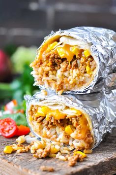 two burritos stacked on top of each other