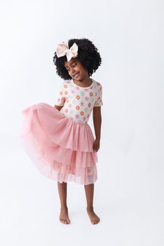 Twirl into spring and summer fun with our Feelin' Flowerful Dream Tutu Dress Crafted from soft, bamboo material, this short sleeve dress is perfect for frolicking and twirling around. Let your little one's unique personality bloom in this fun and playful dress! Made from the softest and most breathable seasonal bamboo viscose material, your babe won't want to take this off! Designed for extra play and all the sass with our ruffle detail to celebrate in style! Pageant Shoes, Girls Dress Outfits, Bamboo Material, Bodysuit Dress, Wedding Dress Shoes, Cap Sleeve Top, Birthday Party Dress, Baby Halloween Costumes, Dress Crafts