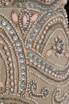 Deco style beaded pattern on this fabulous flapper dress! Perfect wedding party dress If you want more length we could add a beaded fringe at the hemline. Many more pics on fb: https://www.facebook.com/pg/RetroVintageWeddings1920s1930s/photos/?tab=album&album_id=2690442094385150 Gatsby Wedding Dress, Long Sleeve Party Dress, 1930s Style, Deco Dress, Art Deco Dress, Wedding Dresses Beaded, Party Dress Long Sleeve, Beaded Wedding, 1930s Fashion