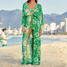 Sweet And Sexy Coverup By Farm Rio Brings The Tropics Straight To Your Closet! Vibrant Tropical Print In Hues Of Lush Green With Tie Styling. Material: Viscose, Lurex Falls Approximately 58.5” From Shoulder Long Sleeve Beach Dress For Party, Chic Long Sleeve Beach Dress For Party, Fitted Green Maxi Dress For Beach Cover-up, Green One-piece Summer Dress, Green Beach Dress For Brunch, Chic Green Maxi Dress For Beach Season, Green Beach Dress For Spring Holiday, Green Long Sleeve Dress For Beach Season, Green Beachwear Dress For Brunch