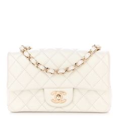 This is an authentic CHANEL Iridescent Calfskin Quilted Mini Rectangular Flap in White. This chic petite shoulder bag is crafted of diamond quilted luxurious calfskin leather in iridescent white. The bag features a long polished gold chain link leather threaded shoulder strap and front flap with a gold Chanel CC turn lock. The flap opens to an interior of matching leather with zipper and patchpockets. Tiny Designer Bags, Most Expensive Handbags, Chanel Mini Rectangular, Chanel Crossbody, Expensive Handbags, Chanel Flap Bag, Iridescent White, Bag Obsession, Future Clothes