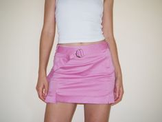 Vintage 90s Y2K BEBE Pink Mauve Belted Mini Skirt -Made by Bebe -Size 2 -68% cotton, 30% nylon, 2% elasthane  -Minor wear -Flat measurements: 13.25" length, 14" waist, 18" hips *All items are final sale Spring Y2k Style Stretch Mini Skirt, Spring Y2k Stretch Mini Skirt, Y2k Style Cotton Stretch Skirt, Y2k Style Stretch Cotton Skort, Y2k Style Stretch Cotton Skirt, Y2k Style Lined Skort For Spring, 90s High Waist Fitted Skirt, High Waist Fitted 90s Skirt, 90s Style Mini Skort For Summer