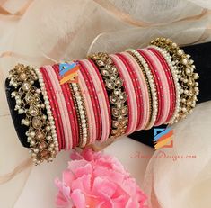 Polki Patti Pearl Pink and Hot Pink Bangle Set. Shipped FREE from Canada to USA, Europe, Italy, Norway, Spain and everywhere else. - Price for both hands Explore more INDIAN BANGLES, Indian Kada, CHURA, Bridal Kada - AMERICAN DIAMOND JEWELLERY 👉 PUNJABI BRIDAL JEWELLERY ONLINE 🛒 INDIAN BRIDAL JEWELLERY Baldeep, Canada ⭐️⭐️⭐️⭐️⭐️ Hello Kiran, Thank you! Thank you!❣️❣️❣️ for velvet phulkari as well as for studs which you send me as a gift. Both are stunning and beyond my expectations. I love you Pink Bangles Set Indian, Pink Bangles Set, Pink Bangles, Bridal Jewellery Online, Thread Bangles Design, Indian Bangles, Indian Bridal Jewellery, Europe Italy, American Diamond Jewellery