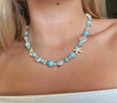 blue mermaid inspired beachy beaded necklace. Made with stretchy string no clasp.  medium size Shell Beaded Necklace, Mermaid Pearl, Shell Beads Necklace, Mermaid Inspired, Blue Mermaid, Palm Coast, Shell Beads, Blue Beads, Chain Styles