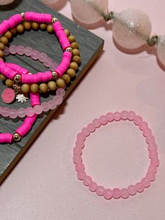 This pink stack of brackets from Byrd and Bead is perfect for spring and summer. Each bracelet sold separately. Pictured: - Heishi Hot Pink and Gold beads bracelet - Solid Light Pink beaded bracelet - Hot Pink Smiley wooden bracelet Gold Beads Bracelet, Hot Pink And Gold, Pink Beaded Bracelet, Pink Smiley, Pink Beaded Bracelets, Wooden Bracelet, Pink Beaded, Gold Bead Bracelets, Pink Beads