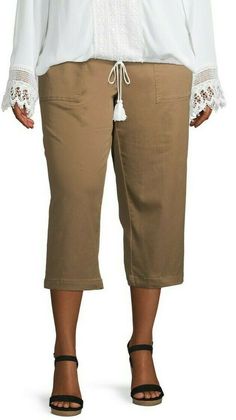 Terra & Sky women's plus utility pocket wide leg capri pants. New. 71% cotton, 25% lyocell, 4% spandex. Machine washable. Inseam is 22 inches. Waist Measurements: 16W - 40 inches 18W - 42 inches 20W - 44 inches 22W - 46 inches 24W - 48 inches 26W - 50 inches Thank You for Shopping With Me! Payment Information I accept Paypal and credit cards through the check out at this time. Payment is due within 48 hours of auction ending.   Shipping Information Most items ship same or next day depending on t Knee-length Capris With Pockets, Spring Knee-length Pants With Pockets, Spring Capris With Side Pockets And Cropped Leg, Relaxed Fit Capris With Side Pockets, Spring Capris With Side Pockets, Fall Knee-length Pants With Pockets, Spring Cropped Leg Capris With Pockets, Spring Capri Pants With Side Pockets, Capri Length Pants With Side Pockets For Spring