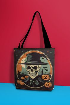 a trick or treat bag with a skeleton wearing a hat and pumpkins on it