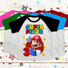 Super Mario Party! Birthday Shirt for the Whole Family Name, age, and colors can be customized on your order. Please include the details in buyer notes with any customization you want. SIZING, MATERIAL AND DESIGN DETAILS True to size and made with love for that special someone. To view the sizing chart please refer to the sizing chart on the last image on this listing Baby sizes include: 6 months - 12 months- 18 months Toddler sizes include: 2T thru 6T Youth sizes include: Youth Extra Small - Yo Personalized Multicolor Birthday T-shirt, Mario Tshirt, Super Mario Birthday Shirt, Luigi Bowser, Super Mario Birthday, Super Mario Party, Mario Luigi, Mario Party, Mario And Luigi