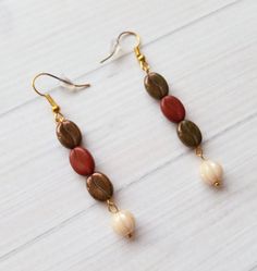 Ah, coffee--good to the last drop! These Coffee Bean earrings are made with Czech Glass Beads and come with silicon earbuds for extra security.  You may also like https://www.etsy.com/listing/741927752/coffeehouse-necklace-with-agate-pendant and https://www.etsy.com/listing/743875578/coffee-ornament-with-caffeine-molecule Bean Earrings, Coffee Ornaments, Caffeine Molecule, Coffee Earring, Coffee Bean Earrings, Vegan Jewelry, Beaded Bangles Bracelets, Aqua Beads, Christmas Necklace