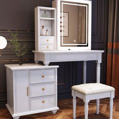 a white dressing table with mirror and stool