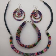 Handmade Set Of Earrings And Bracelet With Collected Blanket That Is Used By Peruvian Artisans From The City Of Cusco. These Earrings Are Made By Hand From Peruvian Blanket Fabric. Circle-Shaped Ethnic Earrings Fair Trade Bracelet Jewelry For Festivals, Fair Trade Festival Bracelet Jewelry, Red Fair Trade Jewelry As A Gift, Handwoven Dangle Jewelry, Handwoven Multicolor Bracelets, Adjustable Multicolor Dangle Jewelry, Handmade Multicolor Dangle Earrings, Handmade Multicolor Dangle Jewelry, Artisan Multicolor Bangle