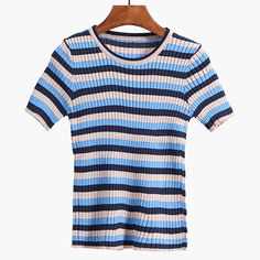 Stretchy ribbed shirt with colorful stripes. One size fits S-L Up to 15" across shoulders 25"-35" chest 7" sleeve length 21" length Fitted Blue Top With Contrast Stripes, Casual Striped Ribbed Tops, Summer Striped Ribbed Tops, Fitted Blue Ribbed T-shirt, Blue Casual T-shirt With Ribbed Collar, Striped Ribbed Short Sleeve Tops, Fitted Striped Ribbed T-shirt, Blue Short Sleeve Tops With Ribbed Collar, Blue Short Sleeve Top With Ribbed Collar