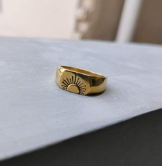 Gold Sun Signet Ring, Sunburst Ring, Brass Half Sun Ring, Stacking Ring, Delicate Sunshine Band Ring, Sun Ring, Gift for Her, Signet Ring                                                                                        Size:- All Size Available In Variation Metal:-brass ❥ Customers' satisfaction is our biggest priority, please contact us with any questions/queries for future or existing orders, and we will do our best to make sure you are happy with your order. ❥Please make sure to add the Delicate Signet Ring, Adjustable Brass Rings For Everyday, Adjustable Brass Signet Ring For Promise, Adjustable Open Signet Ring For Promise, Adjustable Open Signet Ring For Promises, Adjustable Brass Engraved Ring For Promise, Adjustable Vintage Signet Ring For Everyday, Gift Dome Ring Stackable And Adjustable, Vintage Adjustable Signet Ring For Everyday