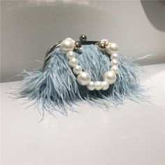 Brand Name: DenHuaKiOrigin: CN(Origin)Place Of Origin: GUANG DONG ProvinceMain Material: PolyesterShape: MinaudiereStyle: FashionHardness: SoftGender: WOMEN Elegant Red Luxury Wedding Shoes, Pearl Bags, Pearl Accessories, Wedding Purse, Fur Bag, Pearl Bag, Evening Handbag, Pink Parties, Ostrich Feathers