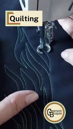 someone is stitching something on the table with scissors