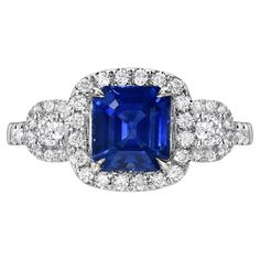 1.79 carat Blue Sapphire emerald-cut, set in a 0.94 carat total diamond, 18K white gold ring. Ring size 6.5. Resizing is complimentary upon request. Returns are accepted and paid by us within 7 days of delivery. Please FOLLOW the TAMIR and MERKABA storefronts to be the first to view the latest of our ultra exclusive jewels and supreme gemstones. Oval Sapphire Ring, Cushion Cut Diamond Ring, Emerald Cut Diamond Engagement, Contemporary Engagement Rings, Sophisticated Jewelry, Green Tourmaline Ring, Blue Sapphire Ring, Sapphire And Diamond Ring, Modern Engagement Rings