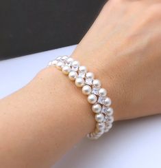 Double strand swarovski white or cream round pearl bracelet | Etsy Pearl Bracelet Wedding, Bracelet Christmas, Bracelet Wedding, Christmas Bracelet, Wedding Jewelry Bracelets, Jewelry Bridal, Bridal Bracelet, Marquise Diamond, Crystal Pearls