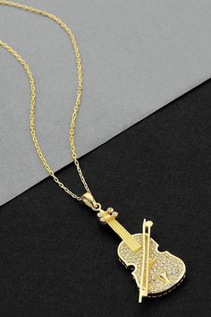 925 Sterling Silver Small Violin Necklace, Violin Jewelry, Music Necklace, Violin Gifts, Sideways Violin, gold necklace * Chain length is 42 cm / 17 inches ⇒ MATERIALS Entirely made of 925 sterling silver. All orders are carefully packaged in a lovely box ready for gift giving, and shipped in a bubble envelope. ❤️WE ARE HERE TO ADD MORE BEAUTY TO YOUR BEAUTY WITH OUR JEWELRY ❤️ ❤️ OUR DESIGNS ARE LIKE A LOVER AT YOUR SIDE ALL THE TIME ❤️ DOES NOT DARKEN ANTI - ALLERGENIC Excellent quality and re Violin Jewelry, Violin Necklace, Cello Necklace, Cheap Adjustable Music-themed Necklace, Violin Necklace Jewelry, Music-themed Pendant Necklaces As Gift, Necklace Music, Gold Necklace Chain, Music Necklace