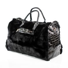 This spacious carrying bag features a fur and leather exterior and designer stylings that make it an impact making addition to any outfit and perfect for either casual or business outings. Product Dimensions (Inches): 21 x 13 x 11 Faux-Leather and Fur Exterior Polyester Lining Everyday Bag Essentials, Bags Patterns, Fur Handbags, Diy Bags Patterns, Image Swag, Strobe Light, Fur Bag, Buy Bags, Dark Feminine