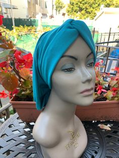 Turquoise color  Stretchy tricot jersey knit quality fabric  Fits most head sizes  Length is medium short at the back  Made in USA Casual Blue Turban, One Size Fits All, Blue Casual Headwrap One Size, Blue Casual One-size Headwrap, Casual Blue Turban, Casual Blue One-size Turban, Casual Green Headscarf, Casual Green One Size Headscarf, Hair Covering, Uptown Girl