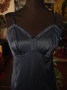 Vintage Navy Lingerie Slip Dress. Smooth Nylon Satin Bodice. Navy Lace Trim Cups.Adjustable straps, accentuates waistline, Excellent Vintage Condition. Small, Size34, waist 30, length 26 inches from under arm to hem, 1960's Vintage, 100 % Nylon, Vanity Fair. Vintage Fitted Camisole With Built-in Bra, Fitted Camisole With Built-in Bra For Night, Womens Lingerie, Navy Lace, Dress Gown, Satin Slip, Satin Slip Dress, 1960s Vintage, Vintage 1960s