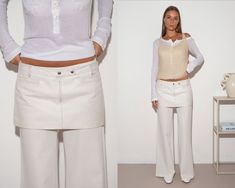 "Crafted from leather, this mini skirt features two welt pockets at the front, belt loops and a front zip and snap button closure. A low-rise style that's fully lined.  DETAILS - Color: Ivory - Label: lavorazione artiginale - Shell: 100% Leather / Lining: 100% Polyester - Made in Italy Shown here with: Silk Beige Camisole, D&G Long Sleeve Tee SIZE & FIT Size indicated: M - Waist: 86cm - Hips: 96cm - Length: 25cm Best fits size S-M, depending on desired drape. Model is 175cm (5'9\"), size XS/S -- This item may be clipped on her in order to get it to fit. Please refer to the product measurements above for best accuracy. CONDITION Excellent SHIPPING Items ship within 1-3 business days. --- For more listings check out our website: www.anew.boutique or join our community on IG @anew.boutique --