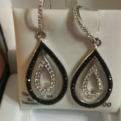 Stunning Sterling Silver Earrings With Black And Clear Crystals. Comes With Orginal Box. See Listing For Matching Necklace. Clear Crystals, Stunning Earrings, Matching Necklaces, Clear Crystal, Sterling Silver Earrings, Washer Necklace, Black Silver, Silver Earrings, Jewelry Earrings