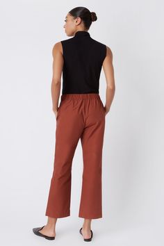 Fall calls for ease with our elastic waist Brit Crop Pant. With a mid-rise fit, angle seam pockets and the perfect leg opening, this style is a breeze to wear in the cooler weather. Pair it with your favorite ankle boot or sneaker, this style is designed for women on the go.THIS ITEM IS FINAL SALE. 1.5" front waistband, elastic at sides and back, angle seams with front pockets, midrise, easy fit, clean finish hem. - 51% Cotton, 49% Nylon - Fabric Woven in Italy - Made in NYC - Professional dry c Sporty Relaxed Fit Pull-on Bottoms, Athleisure Ankle-length Pull-on Pants, Relaxed Fit Pull-on Athleisure Bottoms, Relaxed Fit Athleisure Bottoms With Pull-on Style, Relaxed Fit Athleisure Pants With Pull-on Style, Casual Stretch Sweatpants For Work, Athleisure Straight Leg Bottoms For Elevated Casual, Relaxed Fit Fall Pants With Elastic Side Panels, Fall Pants With Elastic Side Panels And Relaxed Fit