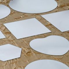 several pieces of paper cut out to look like circles