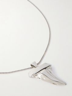 SAINT LAURENT's necklace is crafted from silver-tone brass and strung with a shark tooth pendant, largely regarded as a symbol of protection, strength and power. The thin curb chain is adjustable, so you can customise the length. Saint Laurent Collection, Shark Tooth Pendant, Tooth Pendant, Symbol Of Protection, Shark Tooth, Summer Sunglasses, John Hardy, Shark Teeth, Necklace For Men