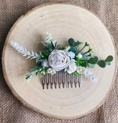 A stunning flower hair comb ideal for weddings. This floral hair piece is perfect for your adult or child bridesmaids or for the bride herself.  The hairpiece is adorned with white mulberry paper flowers, white lavender and faux foliage set on a silver comb.  The size of the comb is approx 15cm at the widest point.  Please take note before buying that I aim to make each item within 3-5 working days. Each order I receive is handmade to order, so if you require sooner than the timescale specified, White Paper Flowers, White Mulberry, Bridesmaid Hair Pins, Floral Hair Pieces, Wedding Hair Piece, Floral Hair Combs, White Lavender, Spring Door Wreaths, Floral Accessories Hair