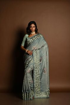 Sage Green Satin Silk Saree with Floral Prints and Parsi Gara Border - Anvi Couture Elegant Pista Green Dola Silk Pre-draped Saree, Elegant Silk Pre-draped Saree With Floral Print, Elegant Pista Green Saree With Floral Embroidery, Elegant Silk Saree With Floral Embroidery, Elegant Green Dola Silk Blouse Piece, Elegant Green Dola Silk Saree, Green Formal Saree, Green Dola Silk Saree With Floral Embroidery, Elegant Unstitched Green Saree