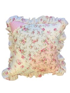 a pink and white pillow with ruffled edges