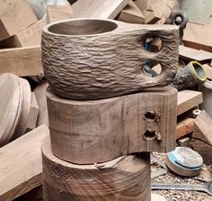 several wooden objects are stacked on top of each other in the process of being made