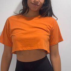 Cute Orange Cropped Top Would Wear To Gym Or With A Pair Of Jean Shorts Never Worn Cheap Sleeveless Orange Crop Top, Casual Cotton Crop Top For Workout, Cropped T-shirt For Summer Workout, Cropped Summer Workout T-shirt, Cropped Workout T-shirt For Summer, Spring Workout Cropped T-shirt, Orange Stretch Crop Top With Short Sleeves, Basic Solid Cropped T-shirt For Summer, Casual Cropped T-shirt For Summer Workout