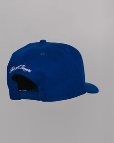 New Era 9FIFTY FIT: Features a classic, throwback look with a flat visor that can curve with a full crown. Includes a structured front panel for stability and an open back with snapback closure. 100% polyester Structured High-profile 7-position adjustable snap closure Please give us 1-4 business days before your order is shipped out. Backwards Hat, New Era Hat, Big Face, Hats Snapback, Plant Collection, Snap Closure, New Era, Open Back, Royal Blue