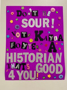 a purple poster with words and flowers on it