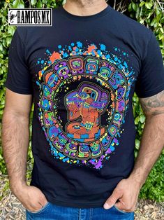 Handmade Serigraphy Print, Mexican Mens Aztec Warrior Piramids T-Shirts Graphic Tees that are super stylish , bright and glow in Blacklight , Neon Lights, Mexican Art Skull Luchador shirts , made by Artisans in Mexico in several designs . Mexican men Shirts. Short sleeve Men's apparel made of ultrasoft 100% cotton, this comfortable style is designed with a classic crew neckline, short sleeves and relaxed Fit, Our t-shirt is a perfect gift for that special person near you. Playera Mexicana de Luchador Santo Artesanal.  Please check the Product images for Size measurements guide Follow us in Instagram and Facebook: @RamposMX Mexican Tshirt, Mexican T Shirts, Mexican Shirts, Mexican Men, Artisanal Design, Aztec Warrior, Mexican Outfit, Handmade Shirts, Shirts Short Sleeve