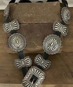 (eBay) navajo sterling silver concho belt. hand stamped quality piece buckle 3” by 2 1/4” conchos 2 1/2” by 2 1/4” butterfly’s 2” by 1 1/2” 14 pieces 45” long (leather) leather can be trimmed to length over 50 years old we ship USA only! (No Alaska or Hawaii) Belt Crafts, Leather Belt Crafts, Navajo Culture, Concho Belt, Vintage Navajo, 50 Years, Leather Belt, Hand Stamped, Alaska