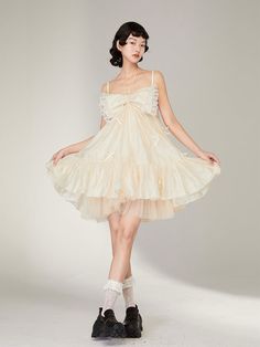 Material:Polyester100%Size: SM Model: 173cm/50kg Length Bust S 84cm 76cm M 89cm 80cm Sleeveless Ruffled Fairy Dress For Summer, Ruffled Sleeveless Fairy Dress For Summer, Suspender Dress With Sweetheart Neckline And Ruffles For Spring, Spring Suspender Dress With Sweetheart Neckline And Ruffles, Beige Party Dress With Adjustable Straps, Spring Lace Fairy Dress, Mini Lace Dresses With Tie Straps, Lace Mini Dress With Tie Straps, Beige Party Dress With Tie Straps