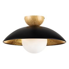 a black and gold ceiling light with a white ball hanging from it's side