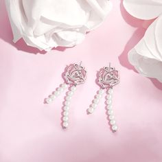 Be bold and dynamic, yet still retain a sense of delicacy and refinement, much like the combination of a flower petal and metal. Our "Rose Amour" Collection showcases an elegant rose design, reflecting the beauty and charm of love blossoming. At the center of each creation, a vibrant pink heart stone serves as a symbol of the passion, warmth, and devotion that are integral to every meaningful relationship. Immerse yourself in the dazzling world of the "Rose Amour" Collection and let its alluring Pearl Threader Earrings, Heart Stone, Flower Petal, Threader Earrings, Stone Heart, Earring Sale, Love Languages, Online Earrings, Rose Design